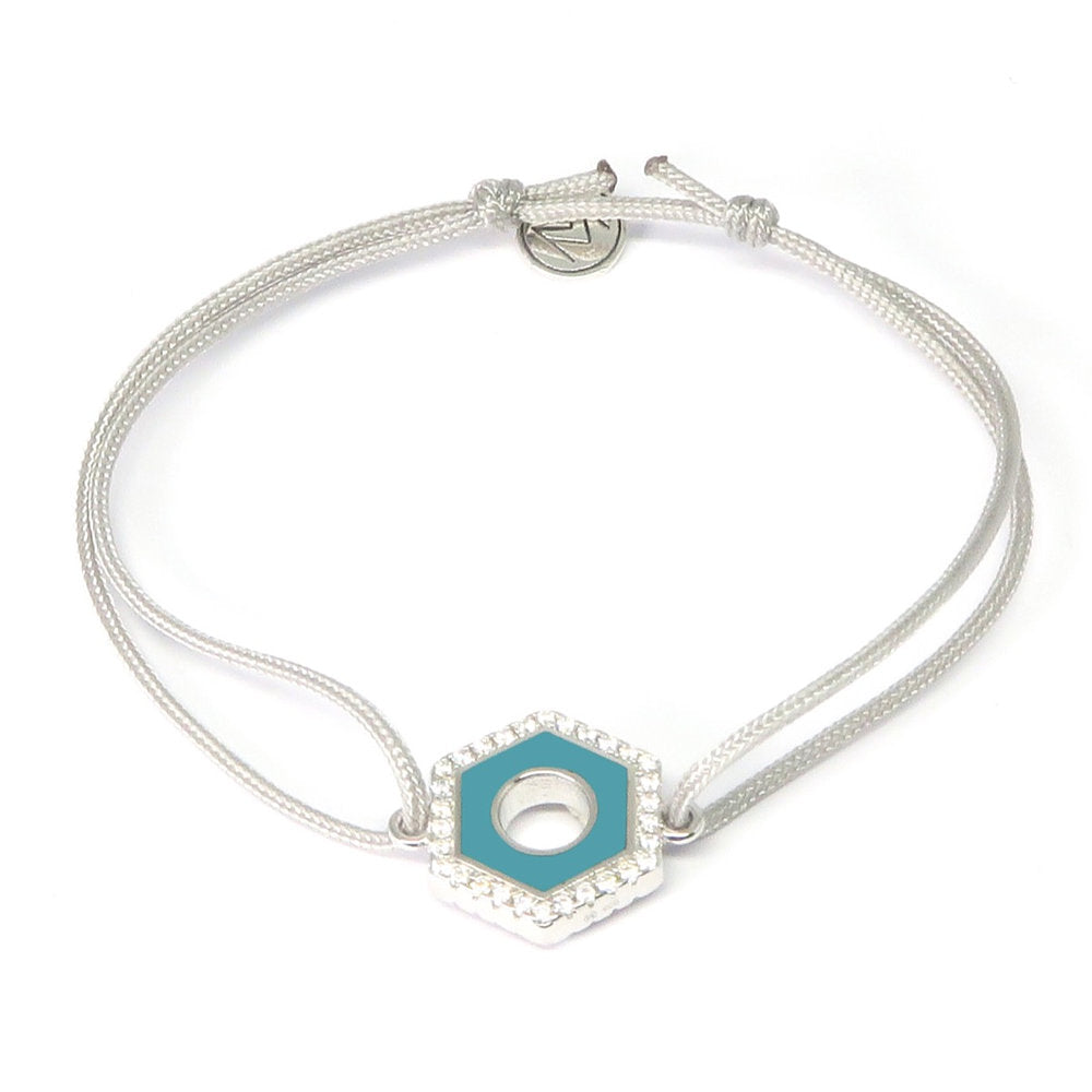 MORA bijoux, bracelet formé d'un écrou émaillé bleu indigo reversible d'une couleur au choix et serti de diams, argent 925 monté sur un cordon ajustable