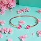 Bracelet "Trèfle à 4 coeurs" émaillé doré rose