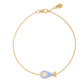 MORA bijoux, bracelet Poisson-coeur lchthys émaillé bleu d'un diamètre de 15mm en or jaune 18 carats. Longueur de la chaîne 16cm avec un petit coeur en or jaune 18 carats soudé sur le fermoir.