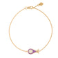 MORA bijoux, bracelet Poisson-coeur lchthys émaillé violet d'un diamètre de 15mm en or jaune 18 carats. Longueur de la chaîne 16cm avec un petit coeur en or jaune 18 carats soudé sur le fermoir.