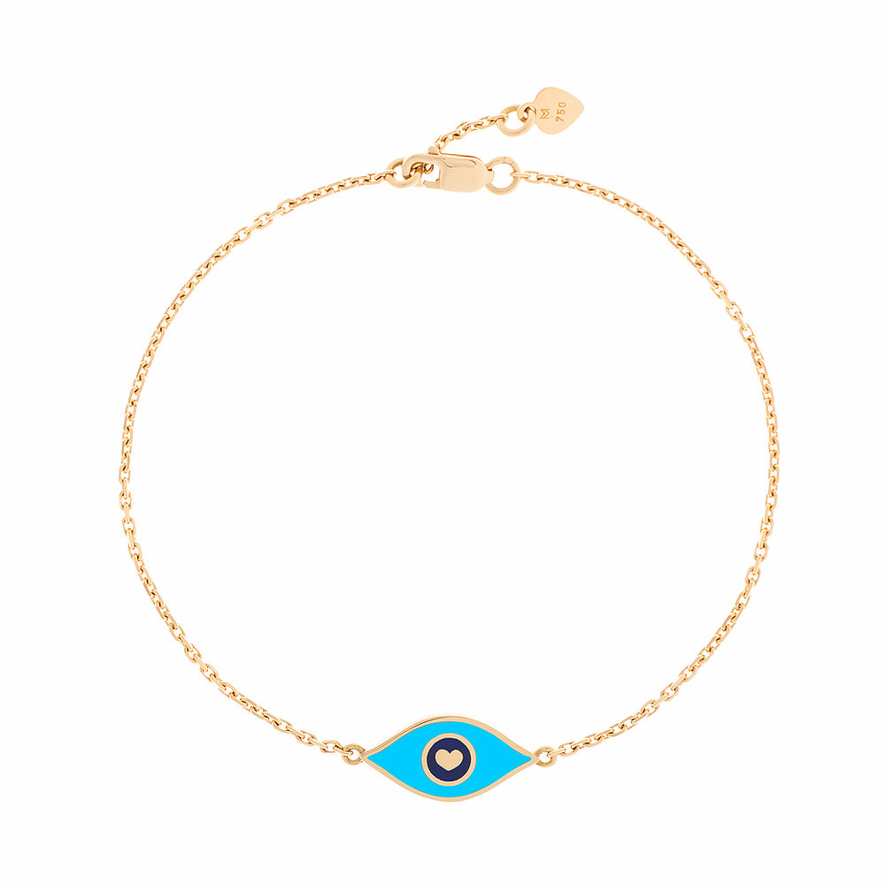 MORA bijoux, bracelet représentant un oeil émaillé bleu ciel en or jaune 18 carats monté sur une chaîne de 10mm d'épaisseur avec un petit coeur en or jaune 18 carats soudé sur le fermoir